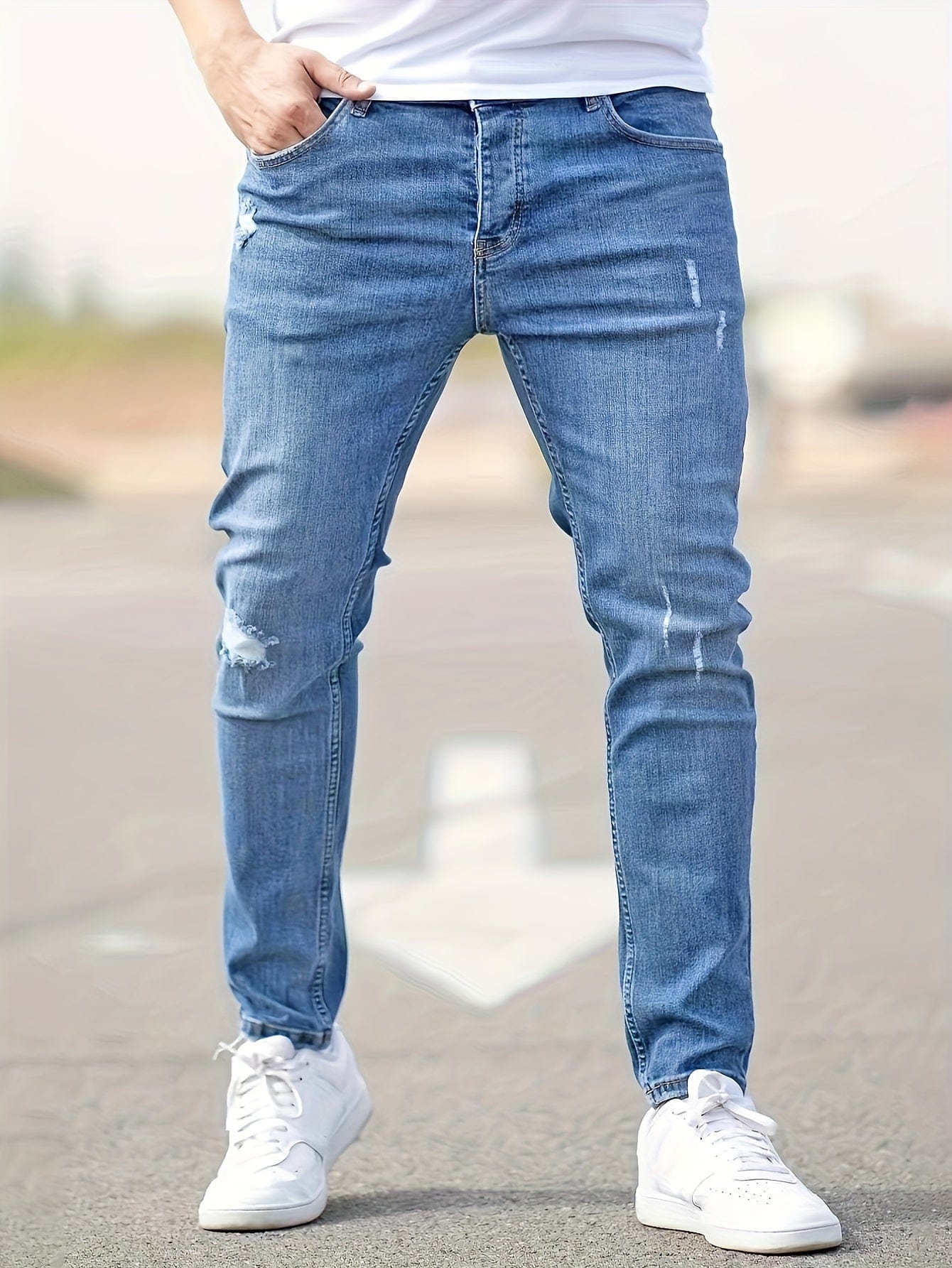 Alex | Jeans slim strappati di tendenza